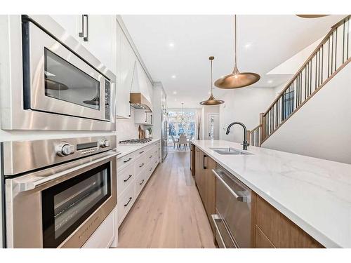 2812A 40 Street Sw, Calgary, AB - Indoor Photo Showing Kitchen With Double Sink With Upgraded Kitchen