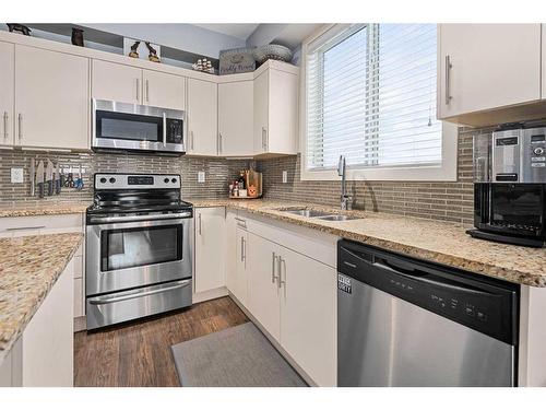 3114-522 Cranford Drive Se, Calgary, AB - Indoor Photo Showing Kitchen With Double Sink