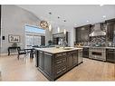 201 Stonemere Bay, Chestermere, AB  - Indoor Photo Showing Kitchen With Upgraded Kitchen 