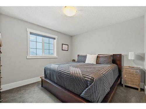 201 Stonemere Bay, Chestermere, AB - Indoor Photo Showing Bedroom