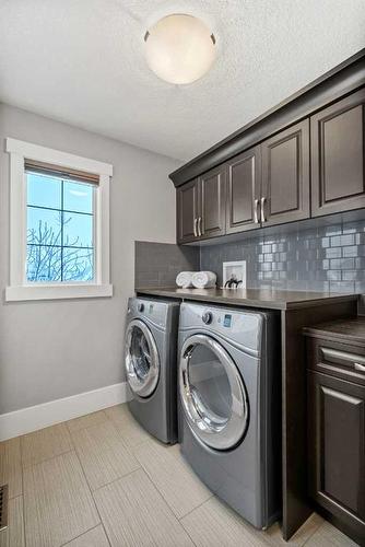 201 Stonemere Bay, Chestermere, AB - Indoor Photo Showing Laundry Room