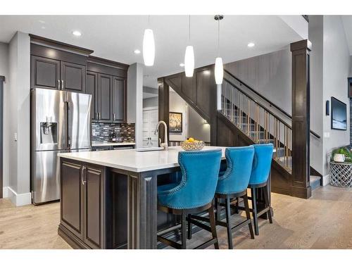 201 Stonemere Bay, Chestermere, AB - Indoor Photo Showing Kitchen With Upgraded Kitchen