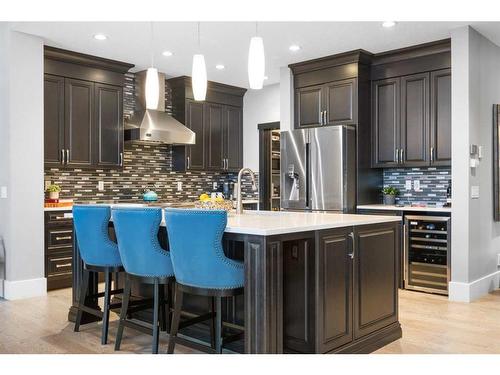 201 Stonemere Bay, Chestermere, AB - Indoor Photo Showing Kitchen With Upgraded Kitchen