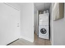 908-205 Riverfront Avenue Sw, Calgary, AB  - Indoor Photo Showing Laundry Room 