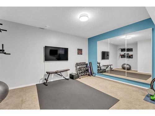 163 Cranarch Circle Se, Calgary, AB - Indoor Photo Showing Gym Room