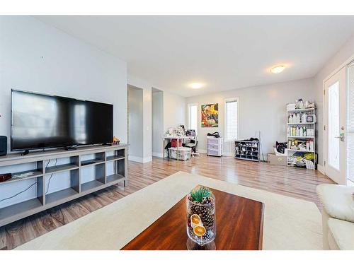 30 Hidden Crescent Nw, Calgary, AB - Indoor Photo Showing Living Room