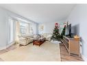 30 Hidden Crescent Nw, Calgary, AB  - Indoor Photo Showing Living Room 