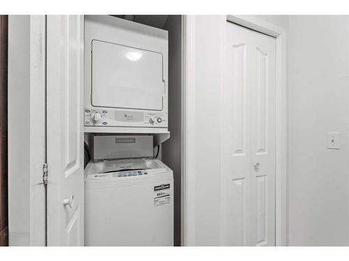 123-550 Prominence Rise Sw, Calgary, AB - Indoor Photo Showing Laundry Room