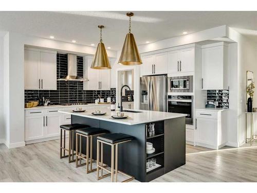 66 Ranchers View East, Okotoks, AB - Indoor Photo Showing Kitchen With Stainless Steel Kitchen With Upgraded Kitchen