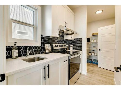 66 Ranchers View East, Okotoks, AB - Indoor Photo Showing Kitchen