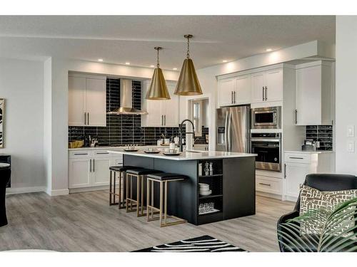 66 Ranchers View East, Okotoks, AB - Indoor Photo Showing Kitchen With Stainless Steel Kitchen With Upgraded Kitchen