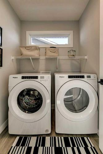 66 Ranchers View East, Okotoks, AB - Indoor Photo Showing Laundry Room