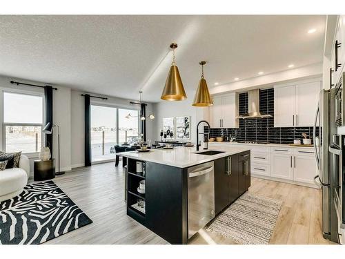 66 Ranchers View East, Okotoks, AB - Indoor Photo Showing Kitchen With Stainless Steel Kitchen With Upgraded Kitchen