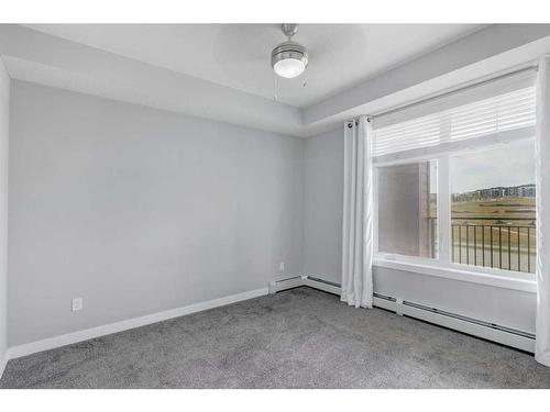 1312-3727 Sage Hill Drive Nw, Calgary, AB - Indoor Photo Showing Other Room