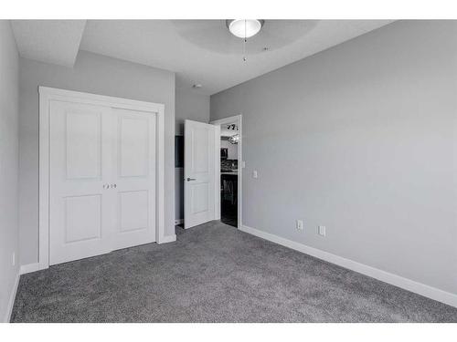 1312-3727 Sage Hill Drive Nw, Calgary, AB - Indoor Photo Showing Other Room