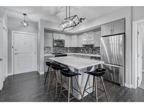 1312-3727 Sage Hill Drive Nw, Calgary, AB - Indoor Photo Showing Kitchen With Stainless Steel Kitchen With Upgraded Kitchen