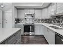 1312-3727 Sage Hill Drive Nw, Calgary, AB  - Indoor Photo Showing Kitchen With Stainless Steel Kitchen With Double Sink With Upgraded Kitchen 