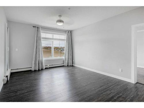 1312-3727 Sage Hill Drive Nw, Calgary, AB - Indoor Photo Showing Other Room