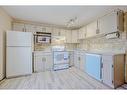 162 Pinemeadow Road Ne, Calgary, AB  - Indoor Photo Showing Kitchen 