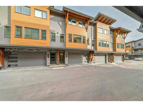 1101 Three Sisters #103I Parkway, Canmore, AB - Outdoor With Facade