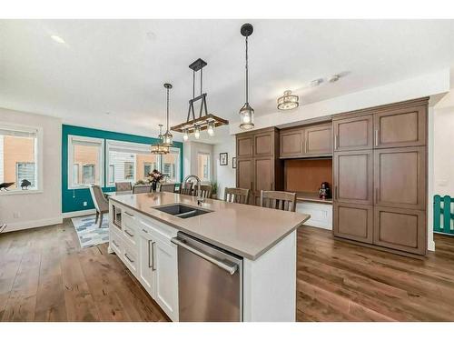 1101 Three Sisters #103I Parkway, Canmore, AB - Indoor Photo Showing Kitchen With Double Sink With Upgraded Kitchen