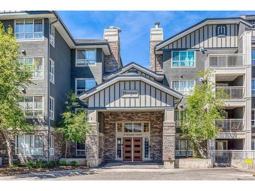 312-35 Richard Court Sw, Calgary, AB - Outdoor With Balcony With Facade