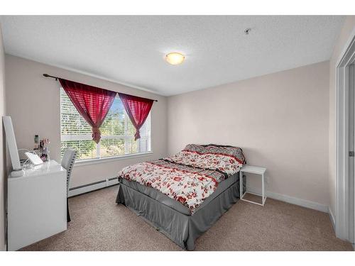 312-35 Richard Court Sw, Calgary, AB - Indoor Photo Showing Bedroom