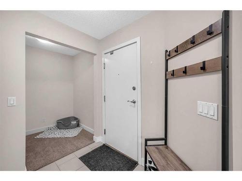 312-35 Richard Court Sw, Calgary, AB - Indoor Photo Showing Other Room