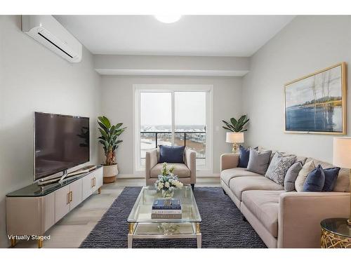 1406-42 Cranbrook Gardens Se, Calgary, AB - Indoor Photo Showing Living Room