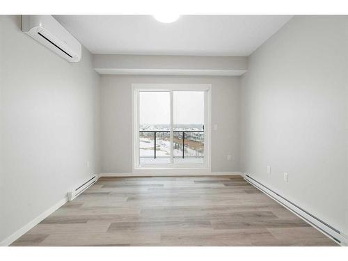 1406-42 Cranbrook Gardens Se, Calgary, AB - Indoor Photo Showing Other Room