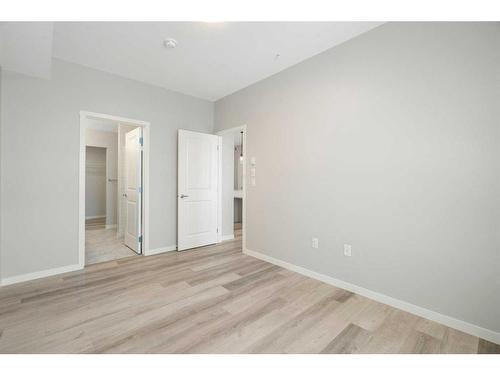 1406-42 Cranbrook Gardens Se, Calgary, AB - Indoor Photo Showing Other Room