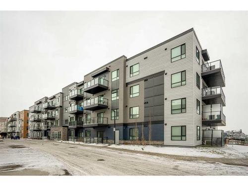 1406-42 Cranbrook Gardens Se, Calgary, AB - Outdoor With Balcony With Facade