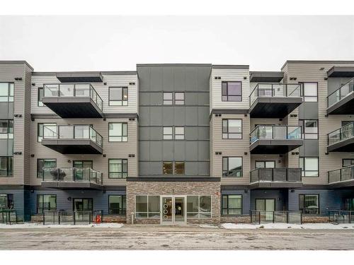 1406-42 Cranbrook Gardens Se, Calgary, AB - Outdoor With Balcony With Facade