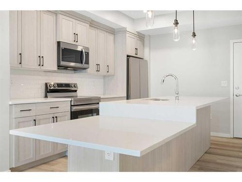 1406-42 Cranbrook Gardens Se, Calgary, AB - Indoor Photo Showing Kitchen With Upgraded Kitchen