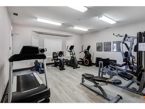 309-2309 Sienna Park Green Sw, Calgary, AB - Indoor Photo Showing Gym Room