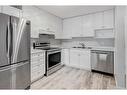 309-2309 Sienna Park Green Sw, Calgary, AB  - Indoor Photo Showing Kitchen With Stainless Steel Kitchen With Double Sink 