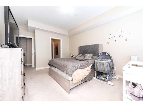 108-1005A Westmount Drive, Strathmore, AB - Indoor Photo Showing Bedroom