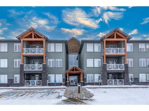 108-1005A Westmount Drive, Strathmore, AB - Outdoor With Balcony With Facade