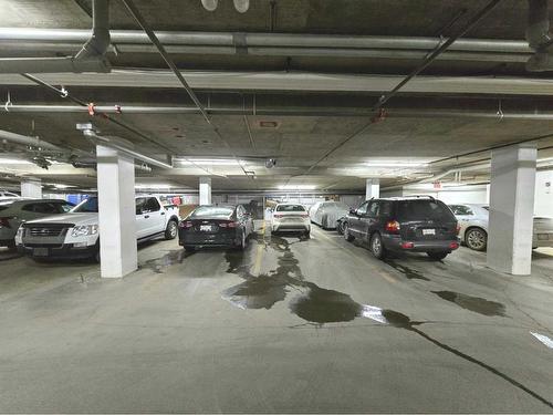 108-1005A Westmount Drive, Strathmore, AB - Indoor Photo Showing Garage