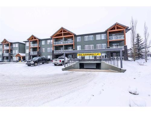 108-1005A Westmount Drive, Strathmore, AB - Outdoor With Balcony With Facade