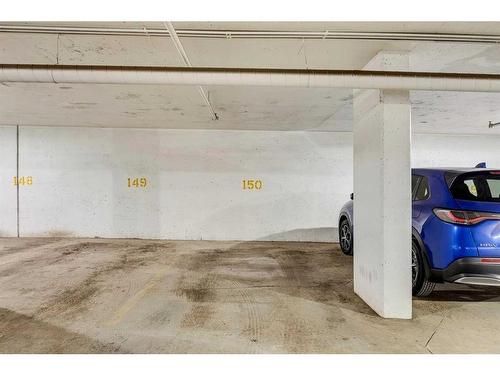 504-1020 9 Avenue Se, Calgary, AB - Indoor Photo Showing Garage