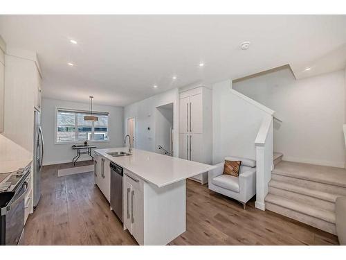 238 Dawson Way, Chestermere, AB - Indoor Photo Showing Kitchen With Double Sink