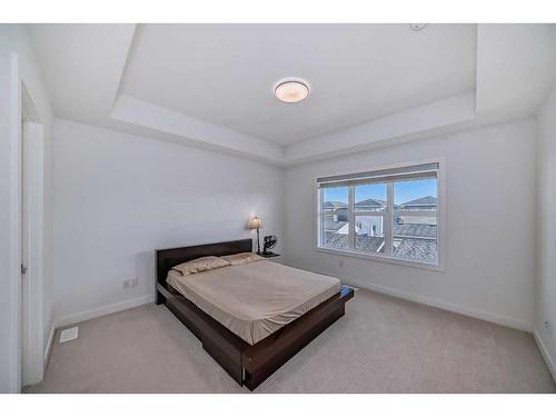 238 Dawson Way, Chestermere, AB - Indoor Photo Showing Bedroom