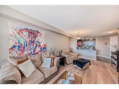 308-15 Saddlestone Way Ne, Calgary, AB - Indoor Photo Showing Living Room