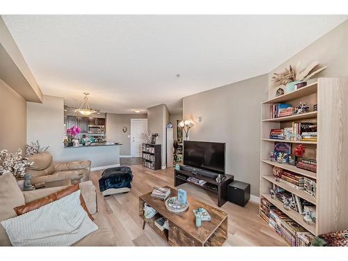 308-15 Saddlestone Way Ne, Calgary, AB - Indoor Photo Showing Living Room