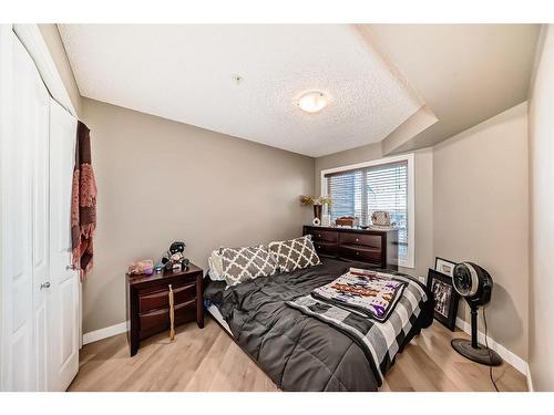 308-15 Saddlestone Way Ne, Calgary, AB - Indoor Photo Showing Bedroom