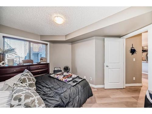 308-15 Saddlestone Way Ne, Calgary, AB - Indoor Photo Showing Bedroom