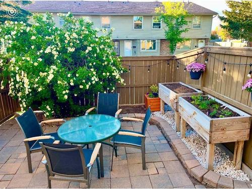 177-123 Queensland Drive Se, Calgary, AB - Outdoor With Deck Patio Veranda