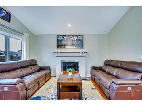 15 Sage Bank Road, Calgary, AB - Indoor Photo Showing Living Room With Fireplace