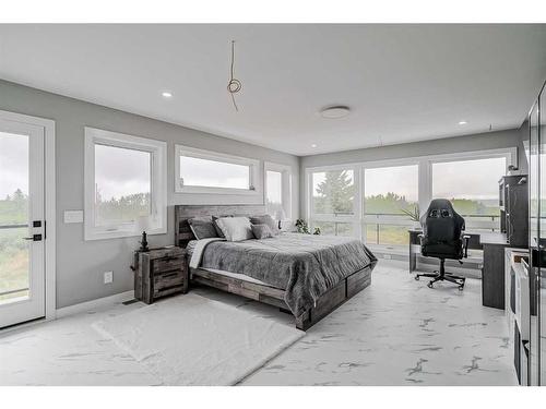 44092 & 44080 Township Road 274, Rural Rocky View County, AB - Indoor Photo Showing Bedroom